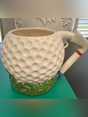 White Golf Ball Ceramic Mug with Green Base and Handle Accent